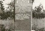 Memorial stone honoring Père René Menard, erected in 1925.