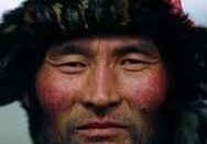 Portrait of an elderly man wearing a fur hat.